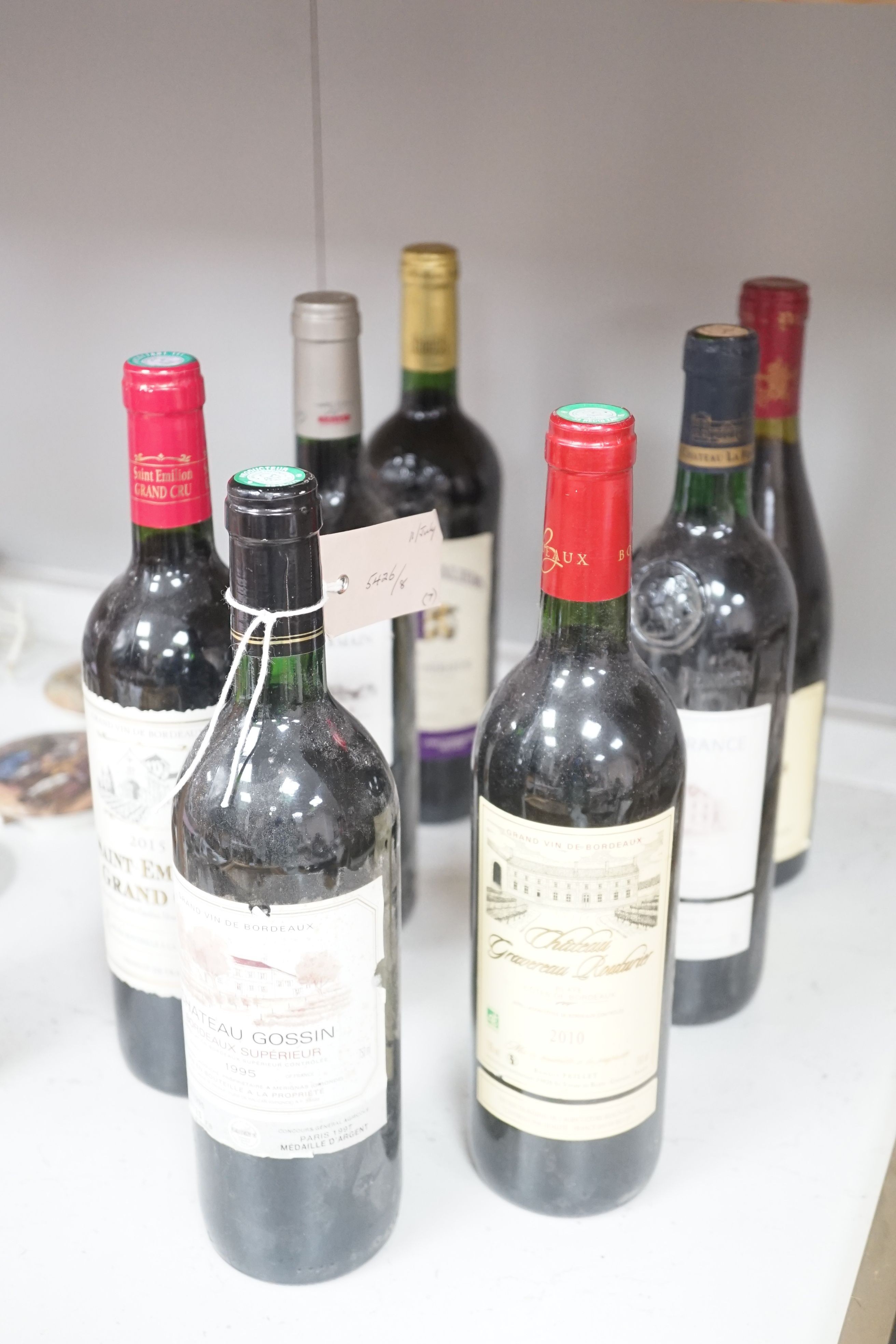 Seven bottles of miscellaneous wine